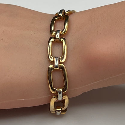 Two-tone sterling and vermeil rectangular link bracelet on wrist