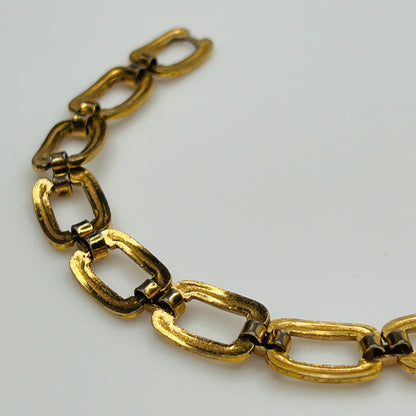 close up of back view of 1980s sterling vermeil bracelet with geometric links