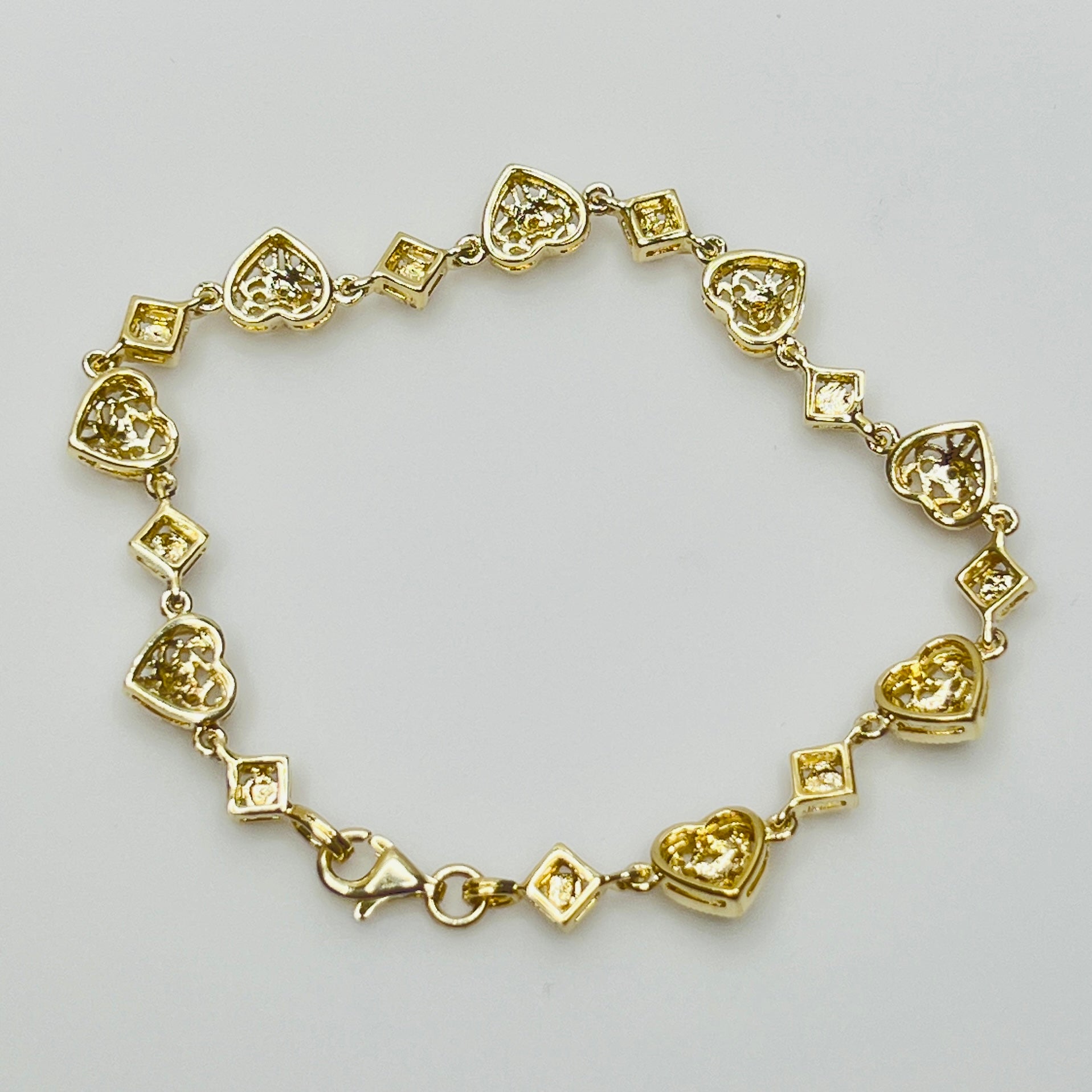 Vintage gold vermeil sterling silver bracelet and heart stud earrings with filigree detail