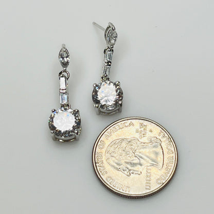 Suzanne Somers 925 earrings with clear rhinestones in prong and bar settings