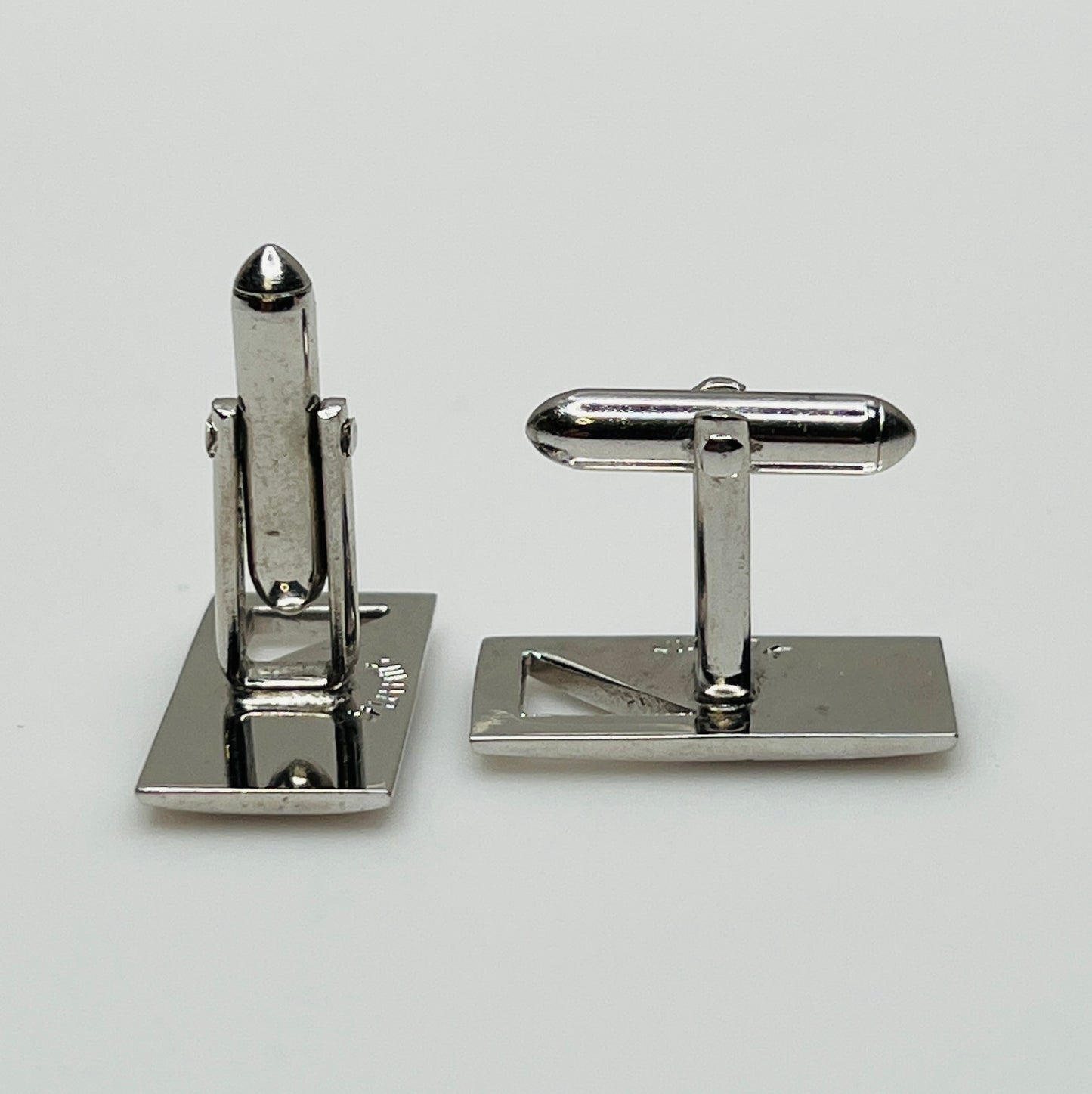 Silver-tone rectangular Swank cufflinks with Art Deco leaf and dot motif, mid-century vintage