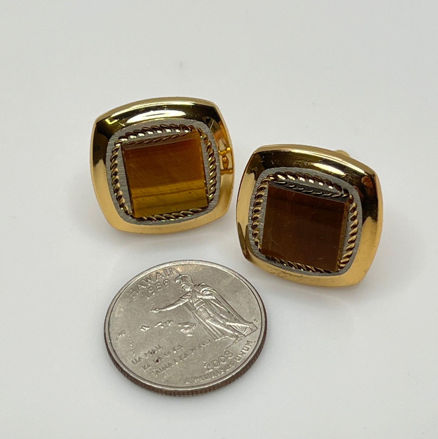 Square goldtone cufflinks with large tiger’s eye cabochons