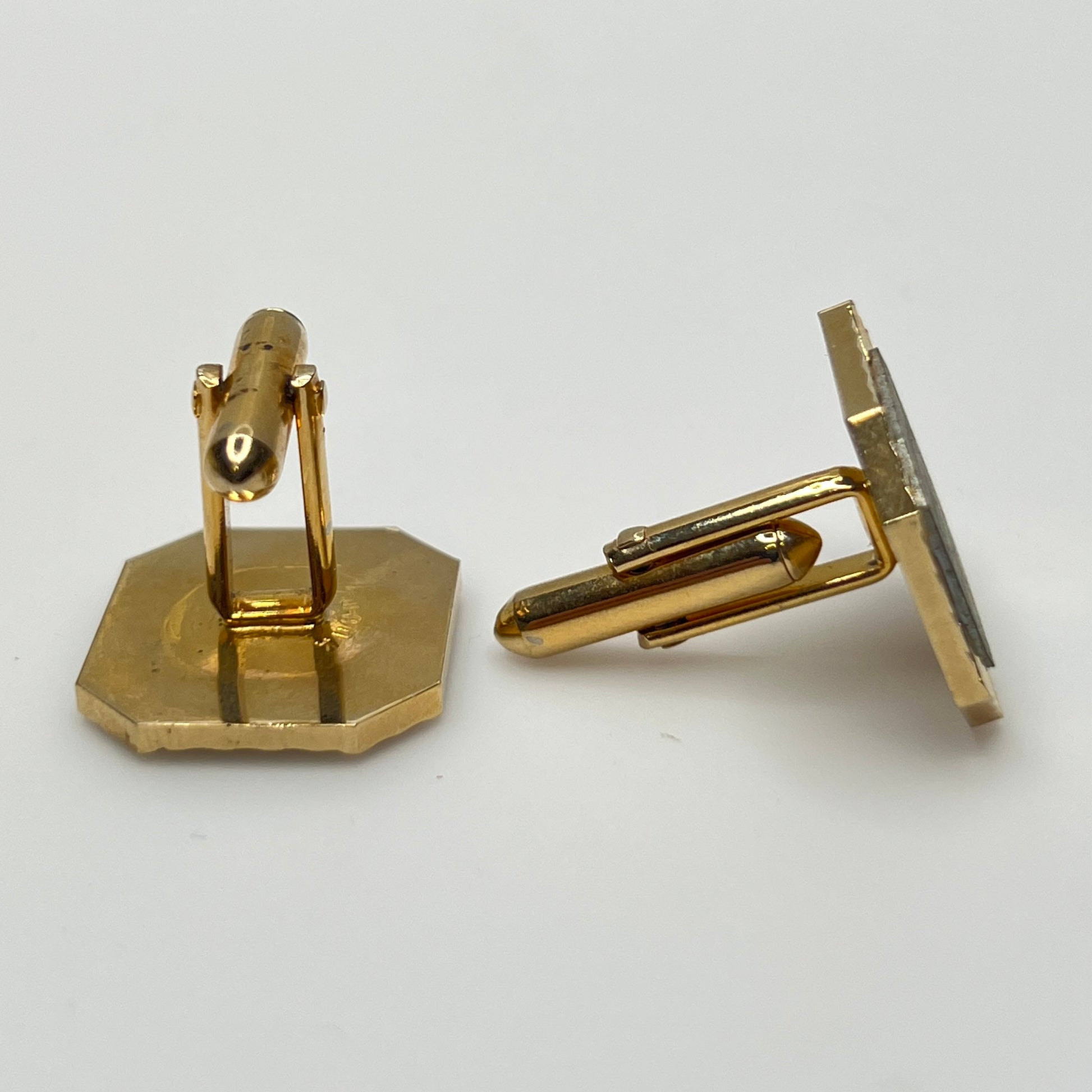 Vintage Swank gold and silver-tone cufflinks with octagonal geometric design