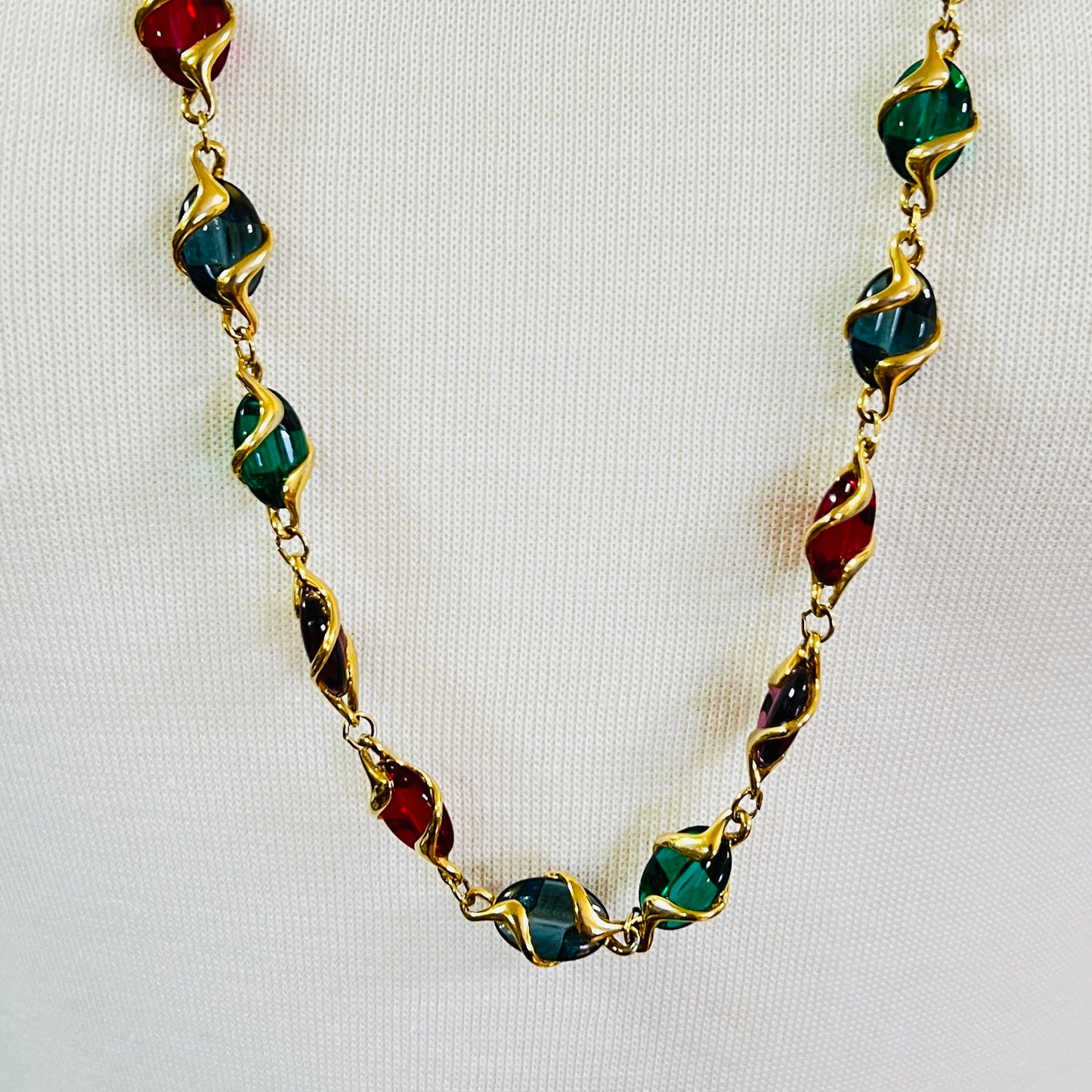 Close up of Swarovski vintage necklace in colorful gold-tone finish