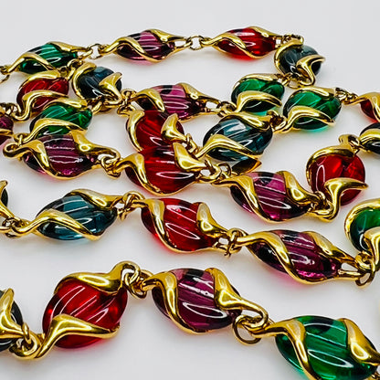 Close up Swarovski vintage necklace in colorful gold-tone finish