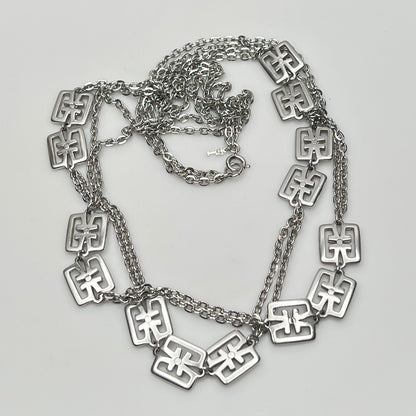 Detail of Trifari symbol hang tag and spring ring clasp