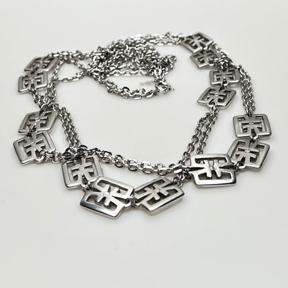 Vintage Trifari silver-tone station necklace with geometric square links