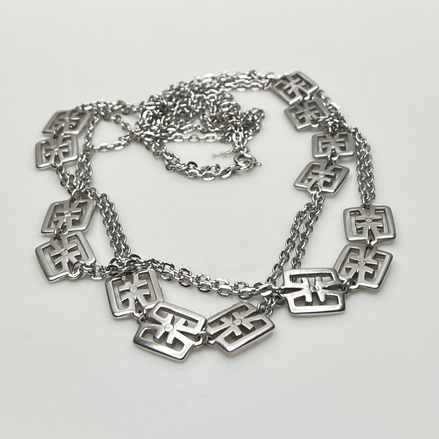 Vintage Trifari silver-tone station necklace with geometric square links