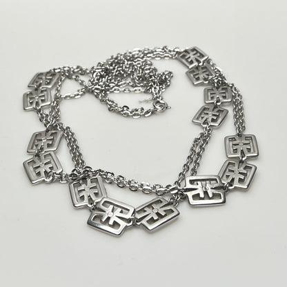 Vintage Trifari silver-tone station necklace with geometric square links