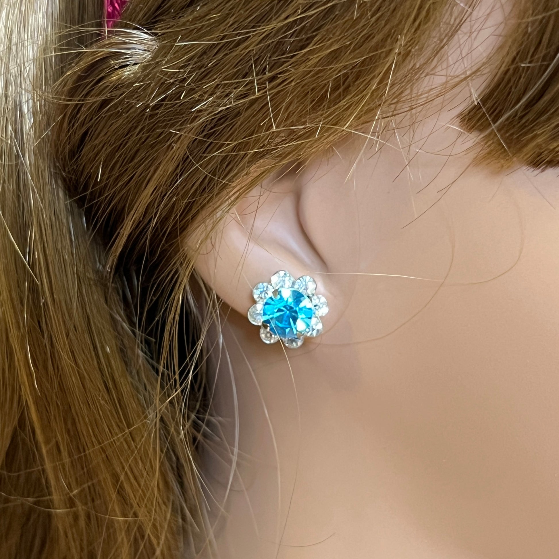 Vintage aqua and clear crystal stud earrings in silver-tone setting