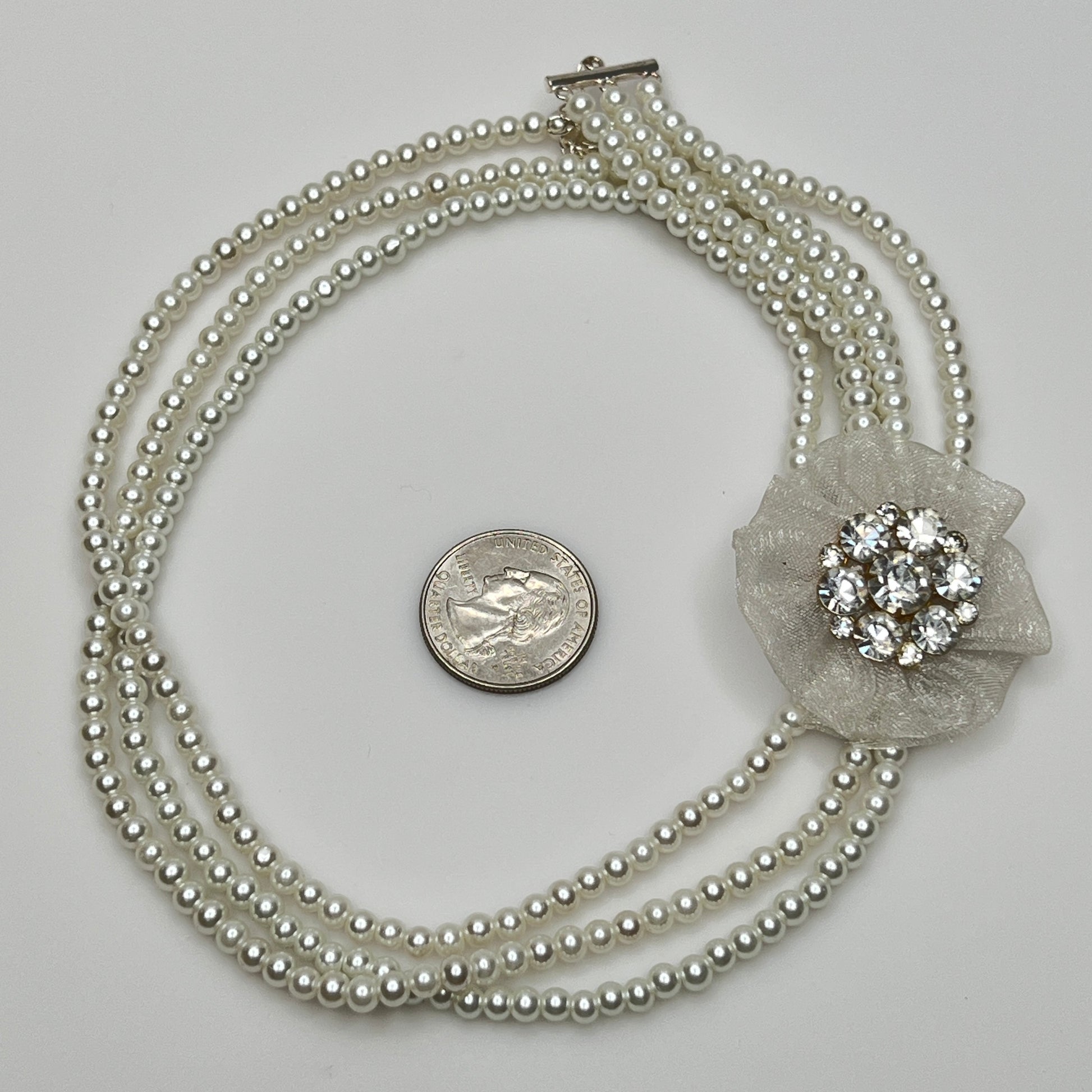 Vintage 3-strand glass pearl necklace with chiffon flower and rhinestone brooch centerpiece
