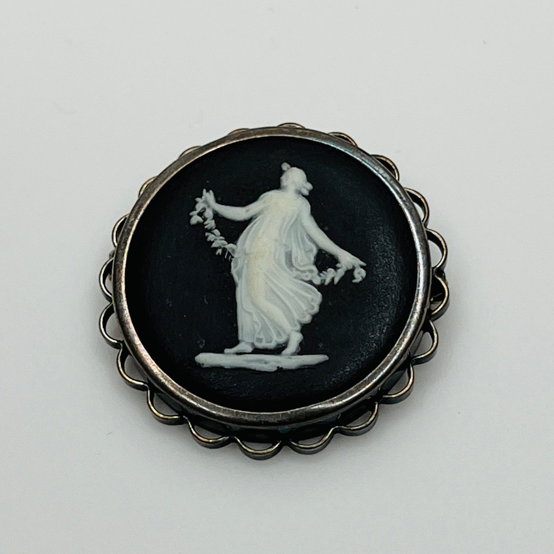Vintage Wedgwood black and white jasperware cameo brooch in sterling silver setting