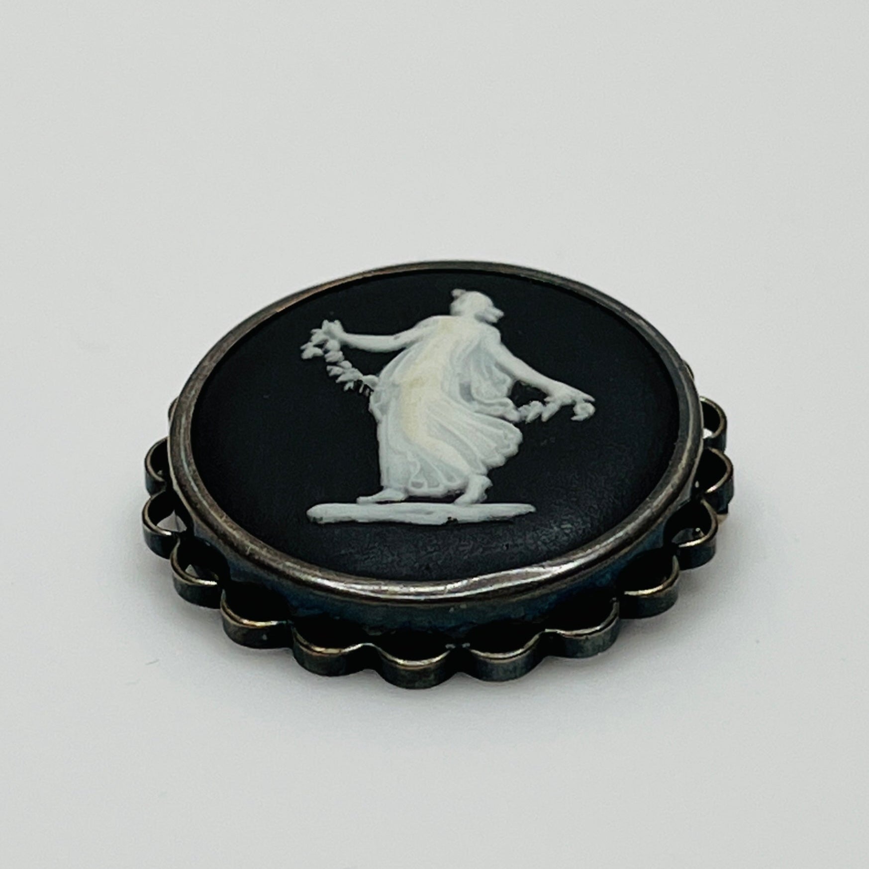 Vintage Wedgwood black and white jasperware cameo brooch in sterling silver setting