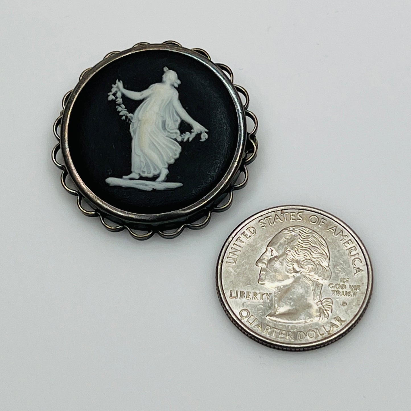 Vintage Wedgwood black and white jasperware cameo brooch in sterling silver setting