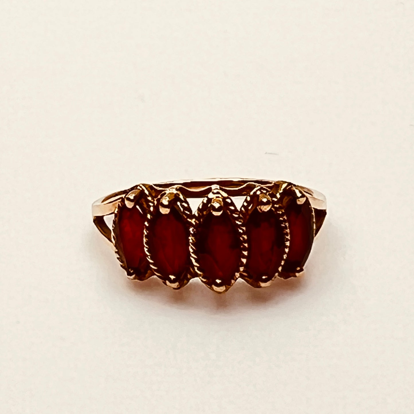 Vintage 10K gold ring with five marquise garnets