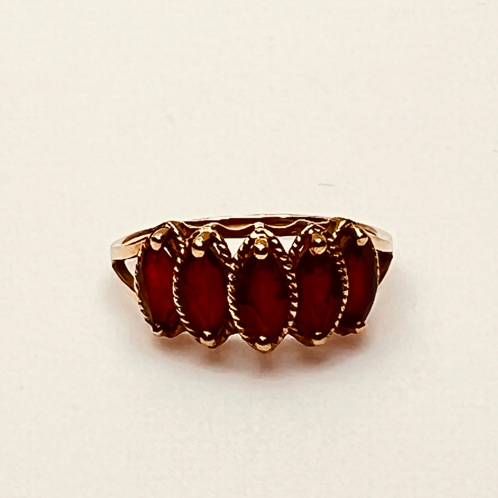 Vintage 10K gold ring with five marquise garnets