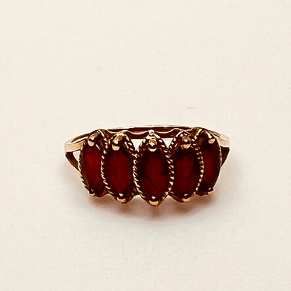 Vintage 10K gold ring with five marquise garnets