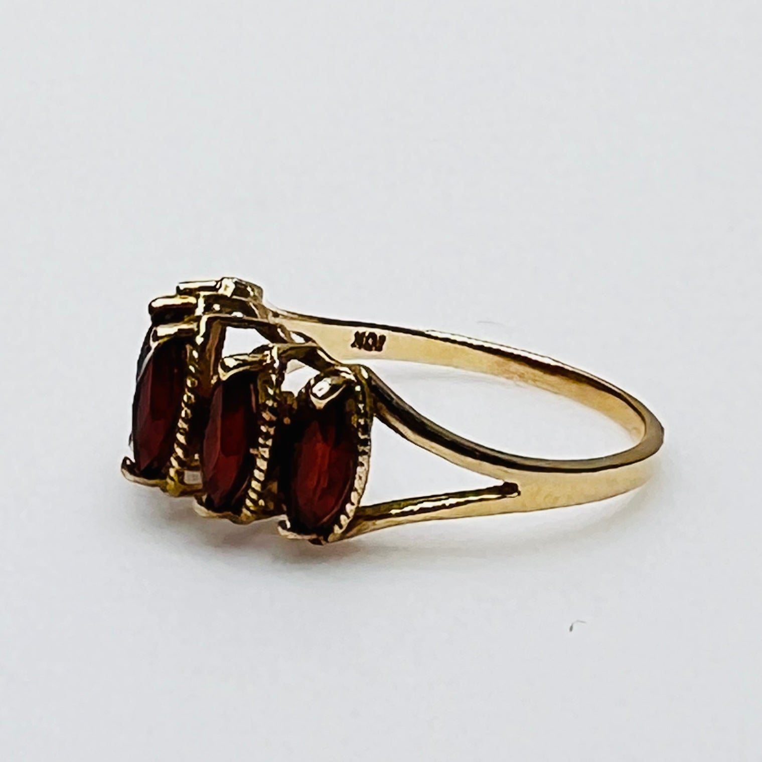 Rear view of ring with visible 10K and T&C stamp in gold band