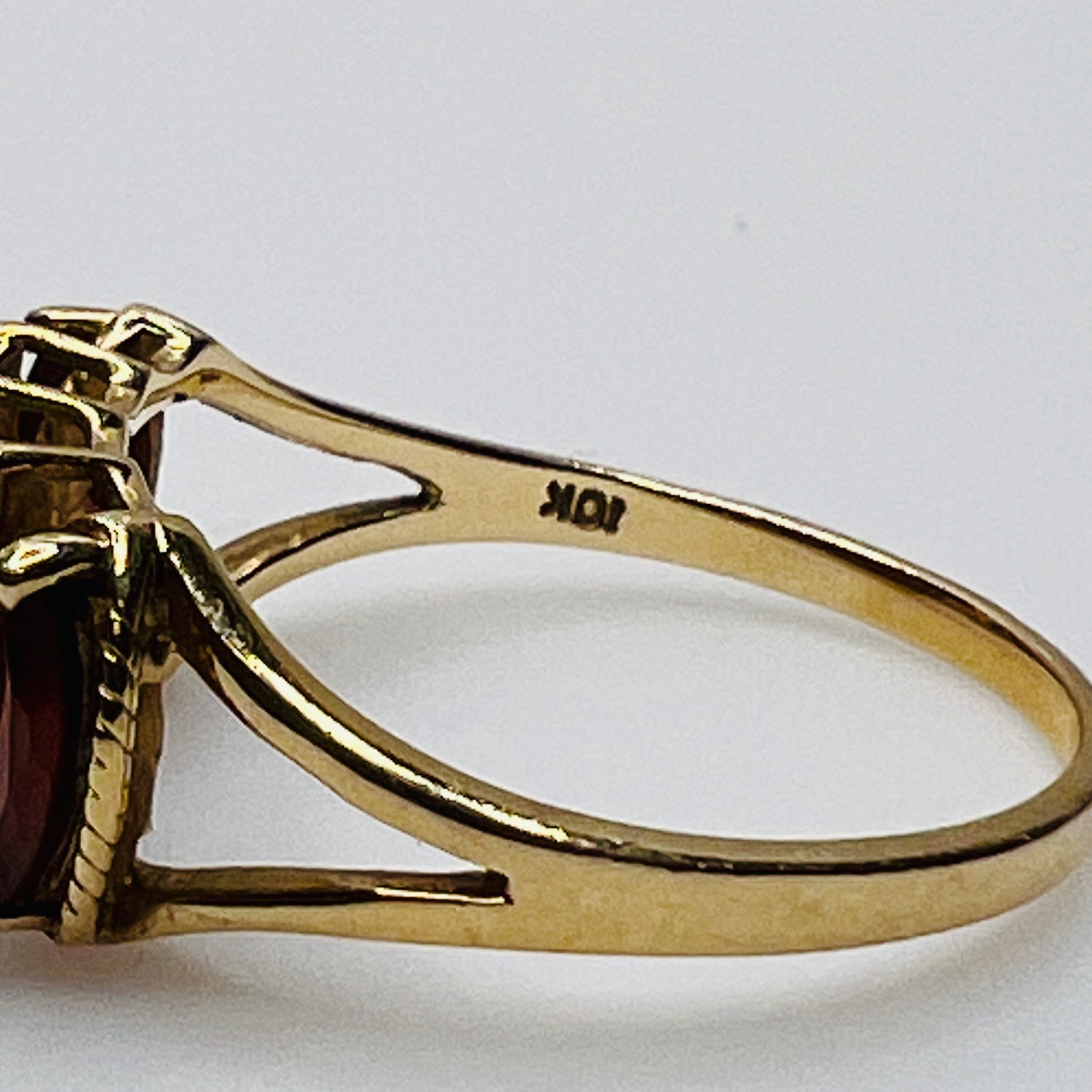 Rear view of ring with visible 10K and T&C stamp in gold band
