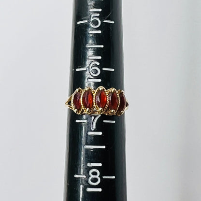 Vintage 10K gold ring with five marquise garnets