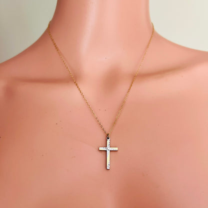 1970s two-tone Carl-Art cross necklace displayed at the neckline on 18-inch chain