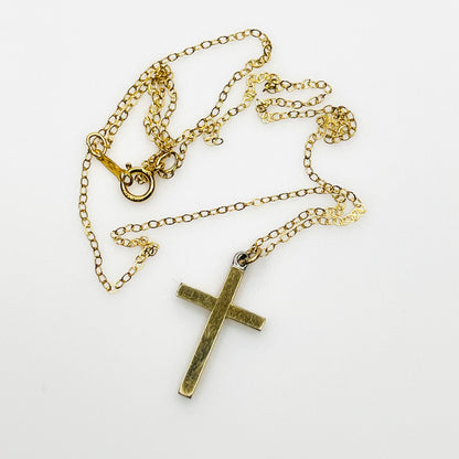 Back view of vintage Carl-Art gold-filled cross pendant and delicate chain