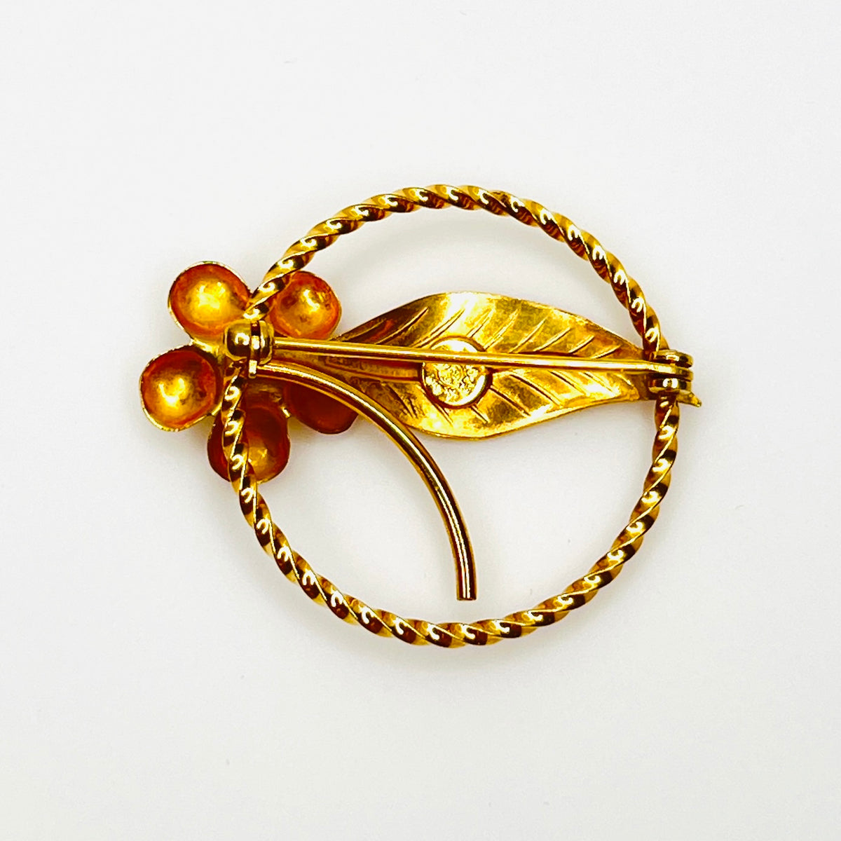 Reverse of vintage 12K gold filled pearl flower circle brooch with pin clasp