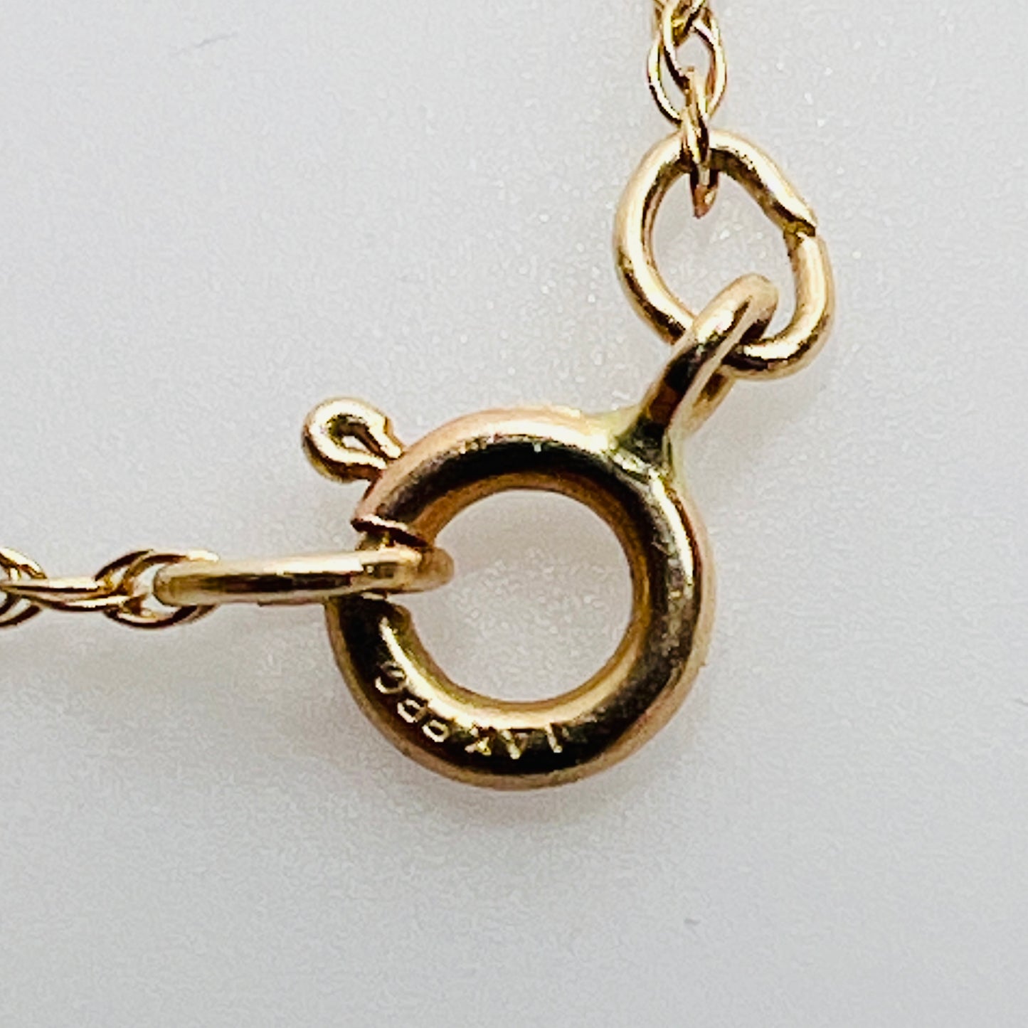 Spring ring clasp stamped 14K gold chain detail