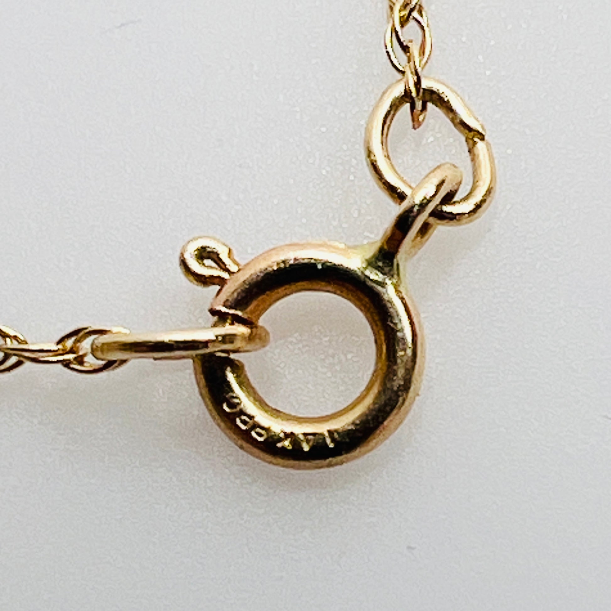Spring ring clasp stamped 14K gold chain detail