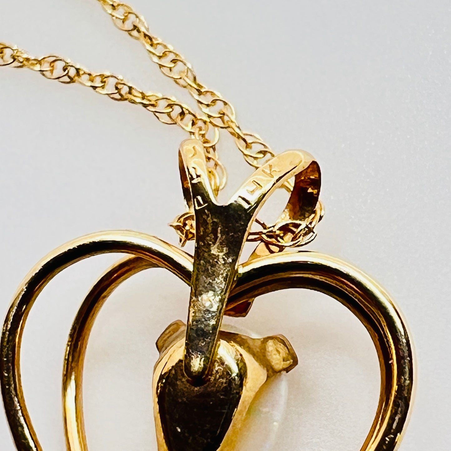 Back of pendant showing 14K PPC stamp vintage necklace