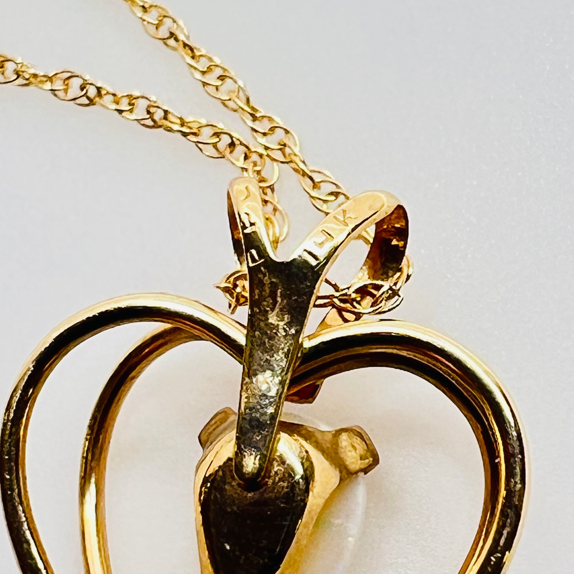 Back of pendant showing 14K PPC stamp vintage necklace