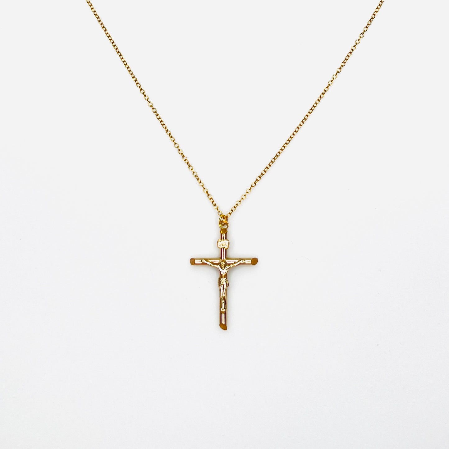 Vintage 14K gold filled crucifix cross pendant necklace on matching gold filled chain.