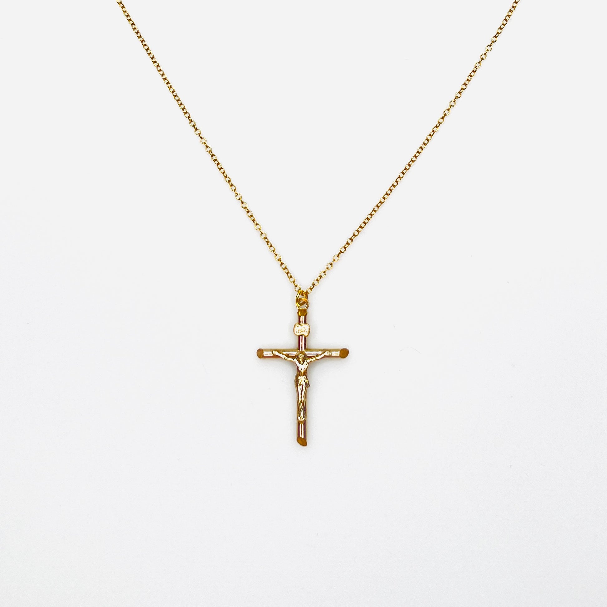 Vintage 14K gold filled crucifix cross pendant necklace on matching gold filled chain.