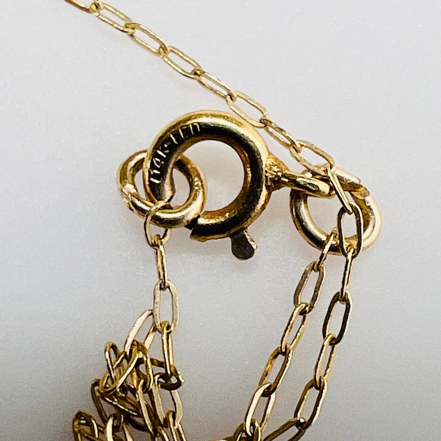 14k gold clasp and chain detail with maker mark
