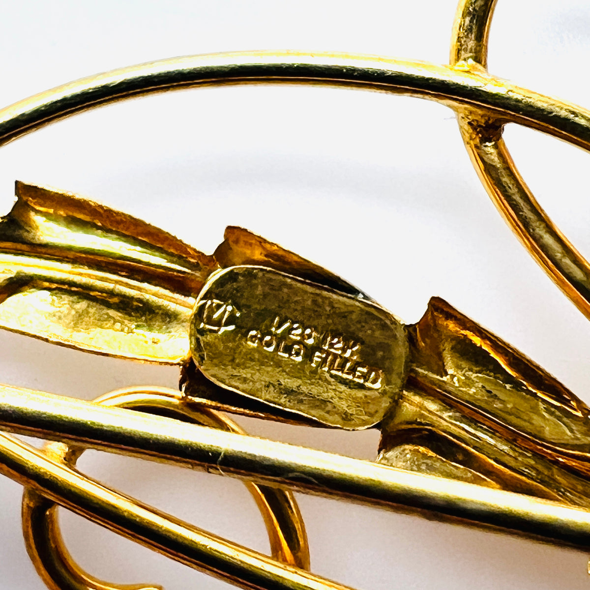 Close-up of MC Michaelson & Sons and 1/20 12K gold filled maker marks