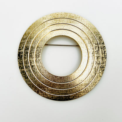 Vintage 1950s large textured gold tone concentric circle brooch with open center