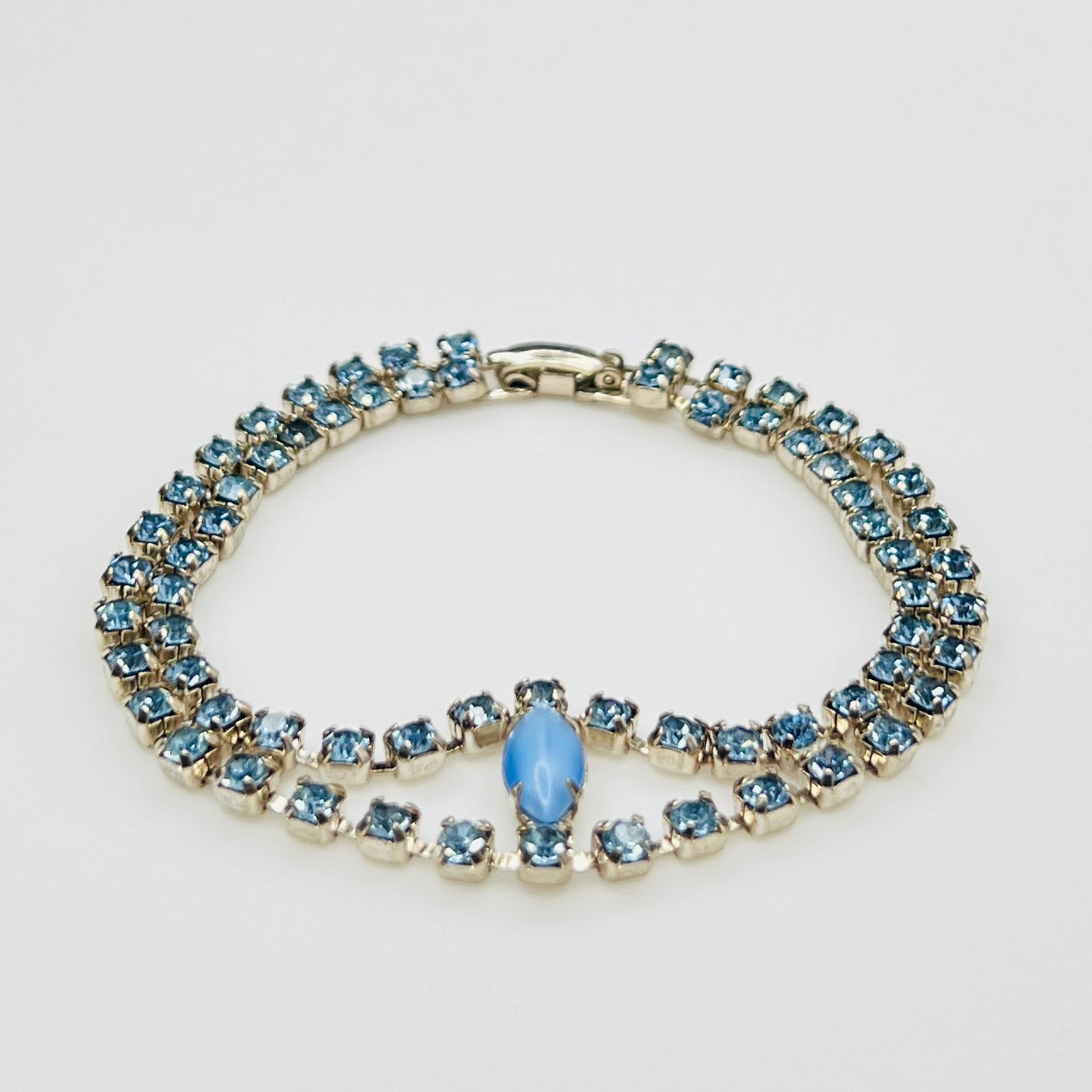 Side view Vintage 1950s blue moonstone and baby blue rhinestone double strand bracelet