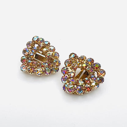 Vintage Continental amber aurora borealis rhinestone clip-on earrings in gold-tone setting.