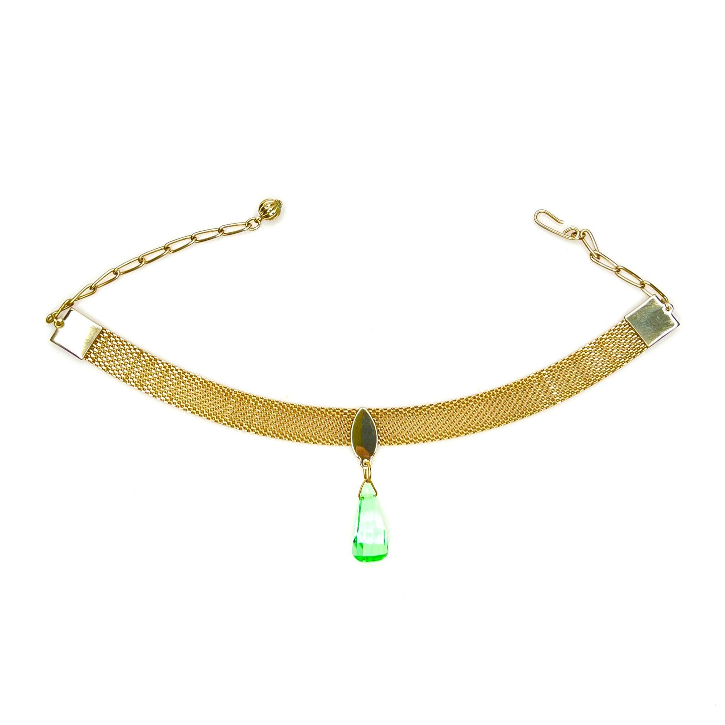 Vintage 1950s gold tone mesh choker necklace with faceted green crystal drop pendant