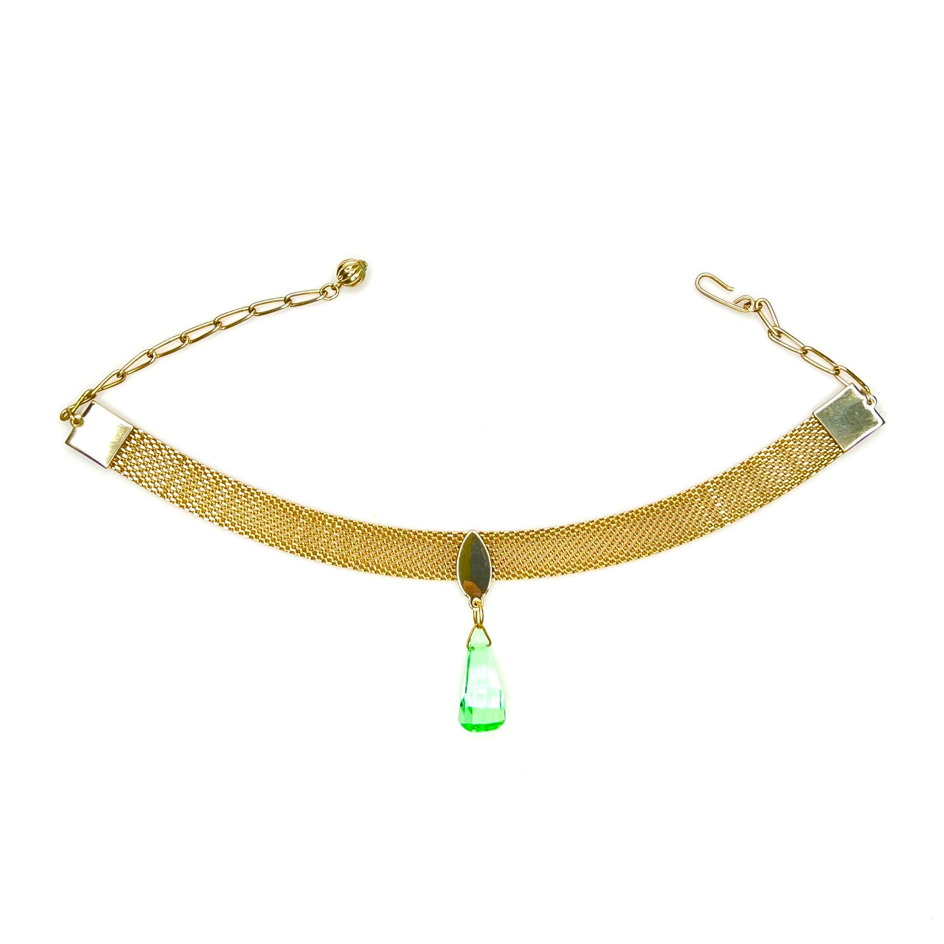 Vintage 1950s gold tone mesh choker necklace with faceted green crystal drop pendant