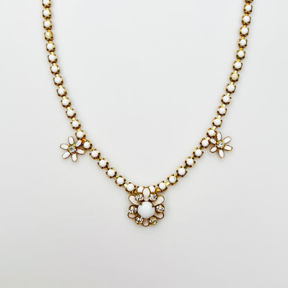 Vintage 1950s milk glass floral choker with rhinestones and white enamel flowers.