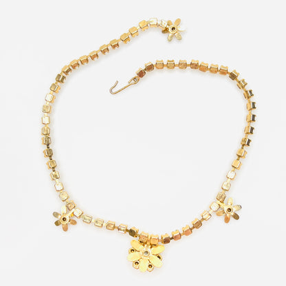 Back view of vintage milk glass and rhinestone floral choker necklace.