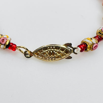 Gold tone filigree box clasp on vintage Murano necklace