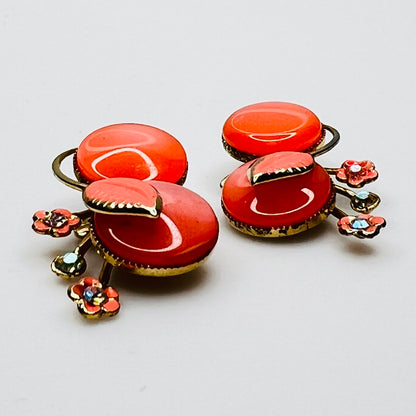 Side view orange enamel moonglow earrings gold tone vintage Coro