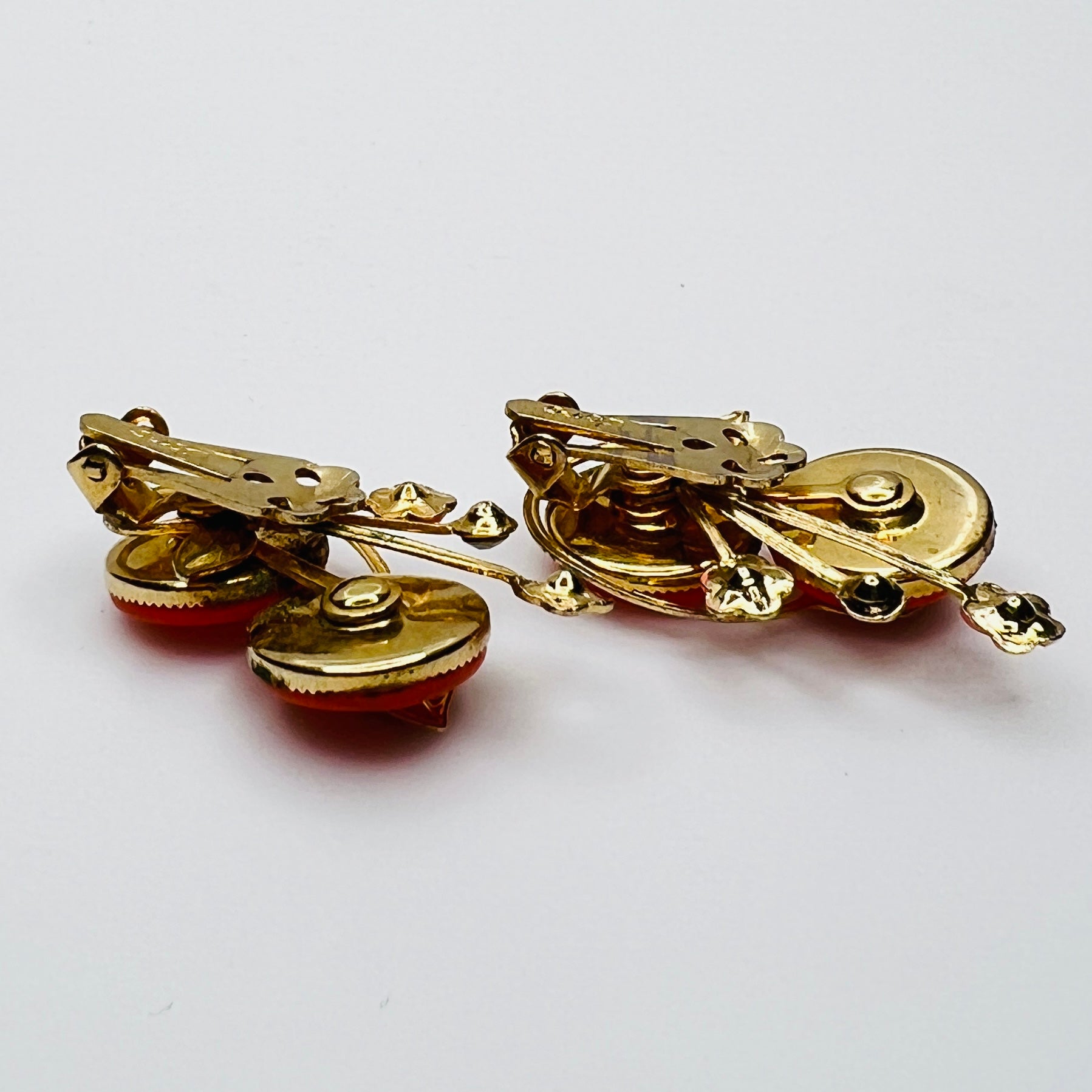 Back view signed Coro clip on earrings gold tone setting