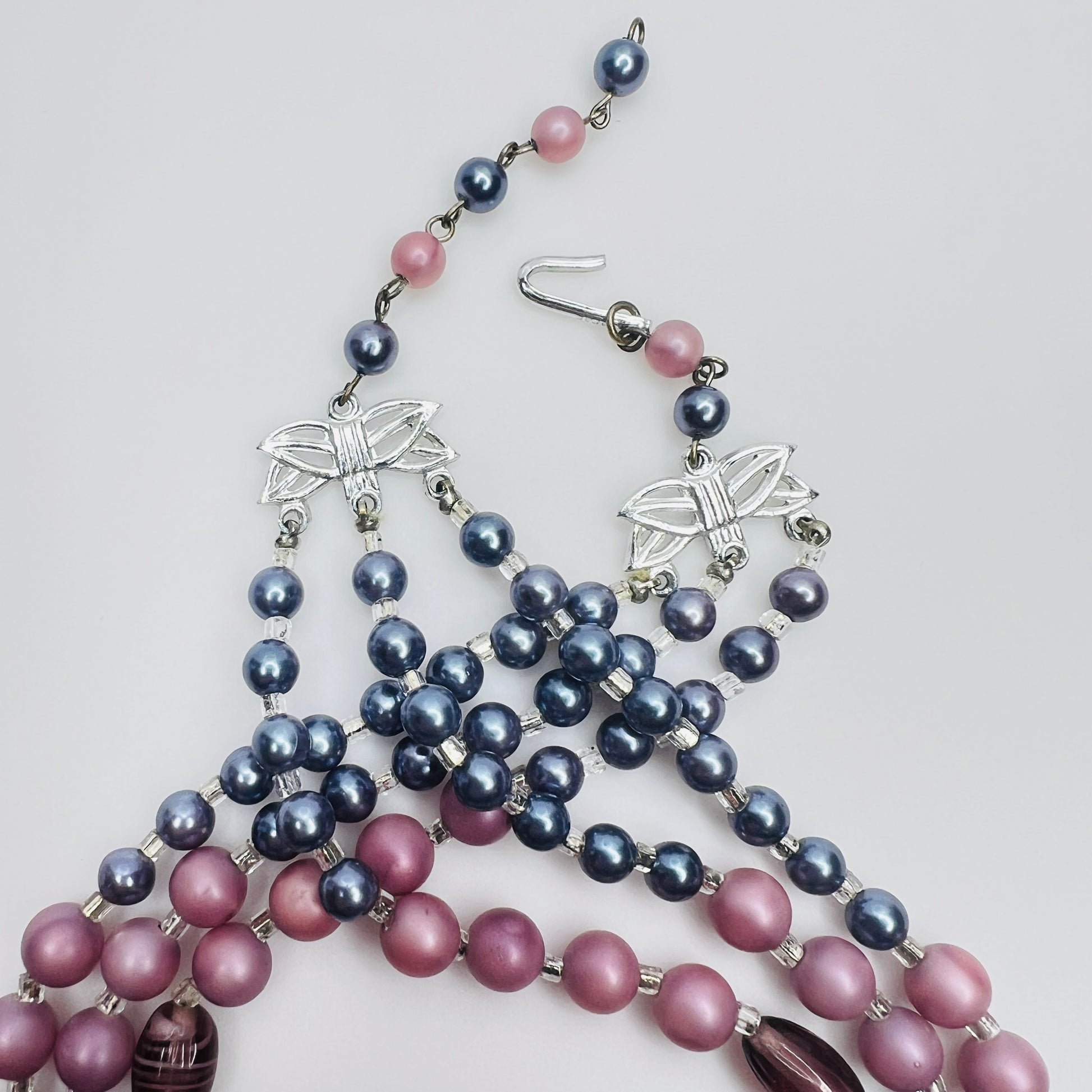 Mixed glass and faux pearl beads with iridescent accents