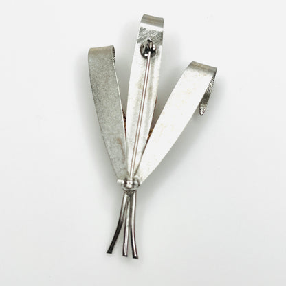 Back of unsigned 1950s silver-tone cattail brooch showing pin closure