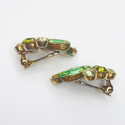 Side profile of vintage prong-set uranium glass clip-on earrings.