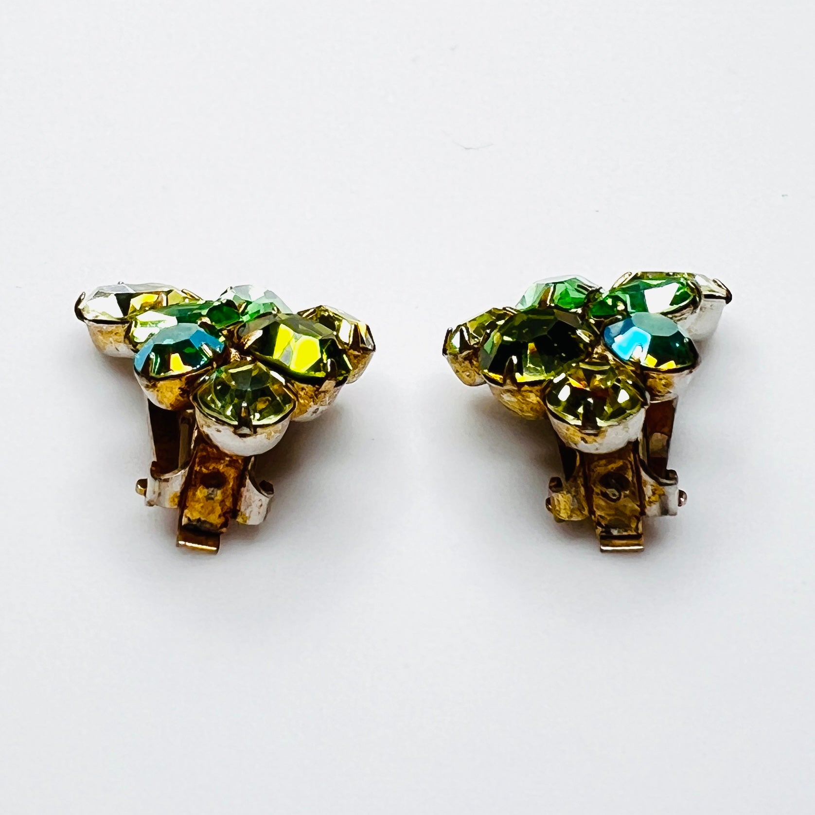 Side profile of vintage prong-set uranium glass clip-on earrings.