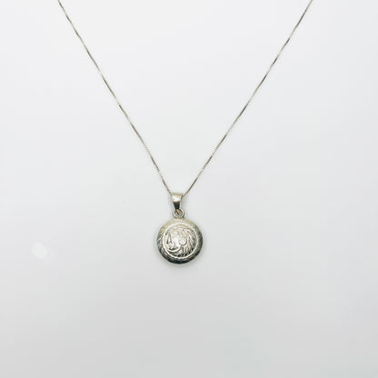 1960s silver Aztec pendant necklace with round Tonatiuh sun god design